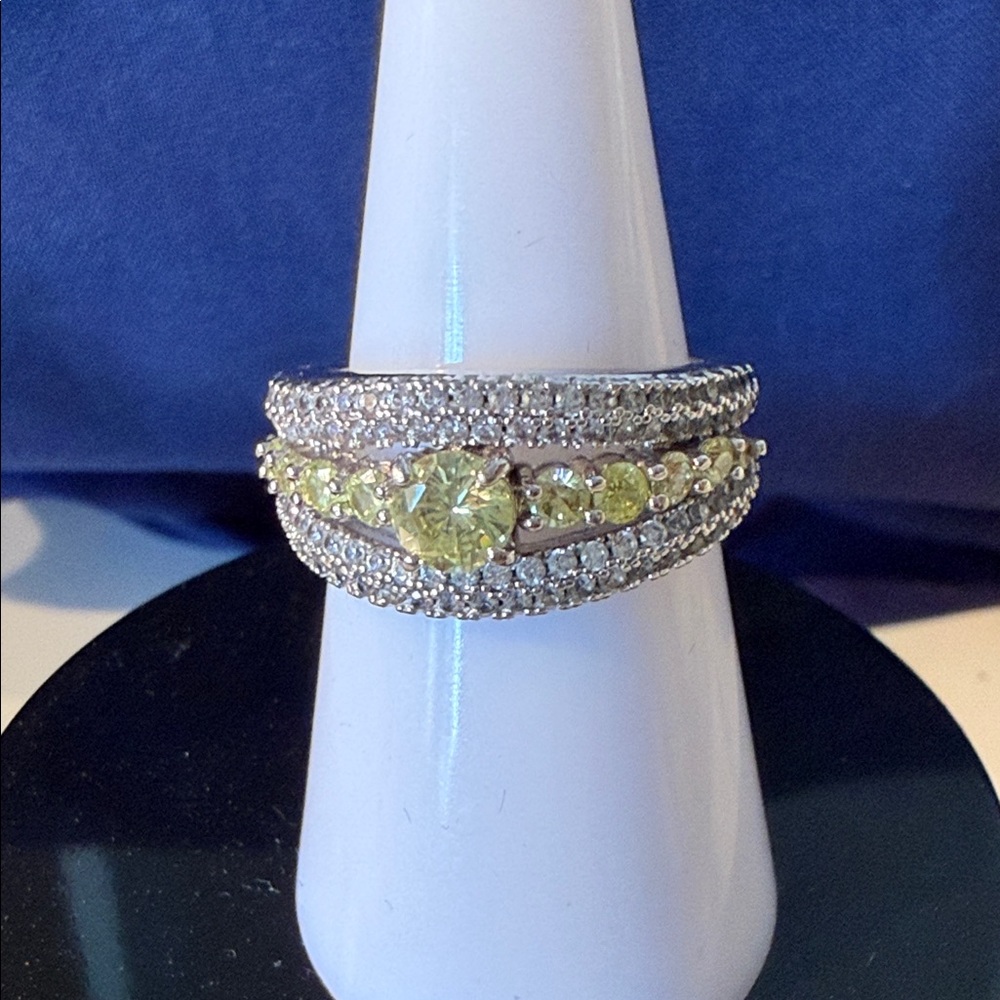 Elegant Silver and Yellow Gemstone Ring